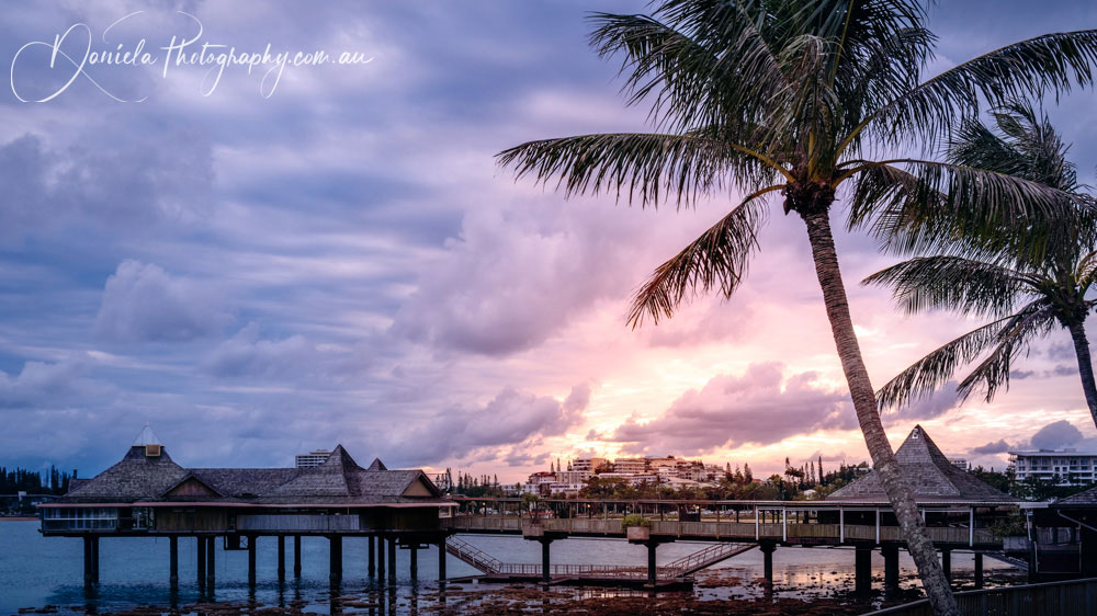 Sunset at the Pier at Anse Vata Bay in New Caledonia